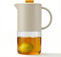 Delove Borosilicate Glass Pitcher with Lid & Auto Spout – Shatterproof Plastic Shell, Wide Mouth Design – 62 oz (1.9 Quart) Jug for Cold/Boiling Water, Iced Tea, Juice (1, Beige)