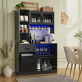 DynJest 67.3" Tall Modern Black Kitchen Pantry Storage Cabinet with Drawer and Shelves, Tilt Out Trash Can, Coffee Bar Wine Cabinet with LED Lights and Power Outlet, Wine Glass Rack, 2 Mesh Doors