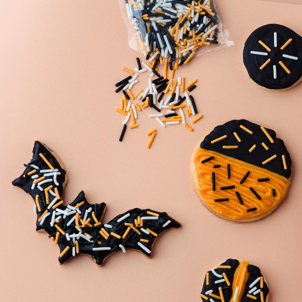 Sweets Indeed Dye-Free Halloween Frosting & Sprinkles Set – 8.22 oz | 2 Frosting Tubes (Orange & Black) + 2 Decorating Tips + 2 oz Sprinkle Mix (Black, Orange & White) | No Artificial Dyes Cupcake & Cookie Decorating Kit